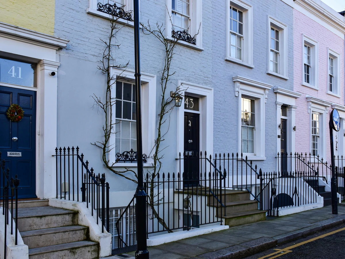 exterior-painting-colourful-victorian-terraced-cheshire-painters White rendered detached property masonry painting in Wilmslow