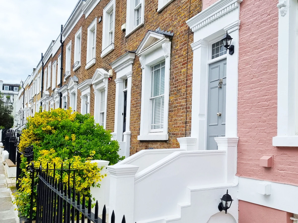 Row of terraced houses with rendered exterior in Cheshire painted by Cheshire Painters