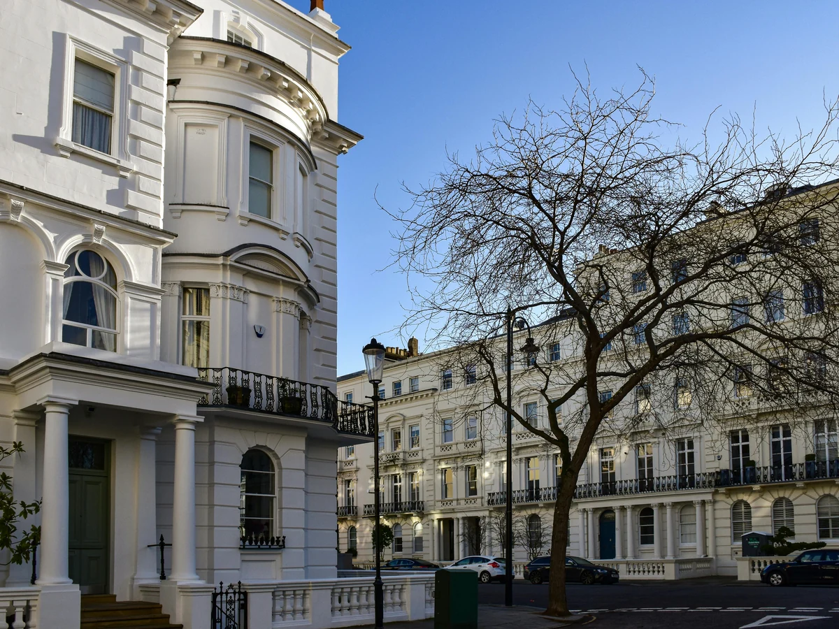 Common exterior painting problems in Cheshire - white Georgian townhouse by Cheshire Painters