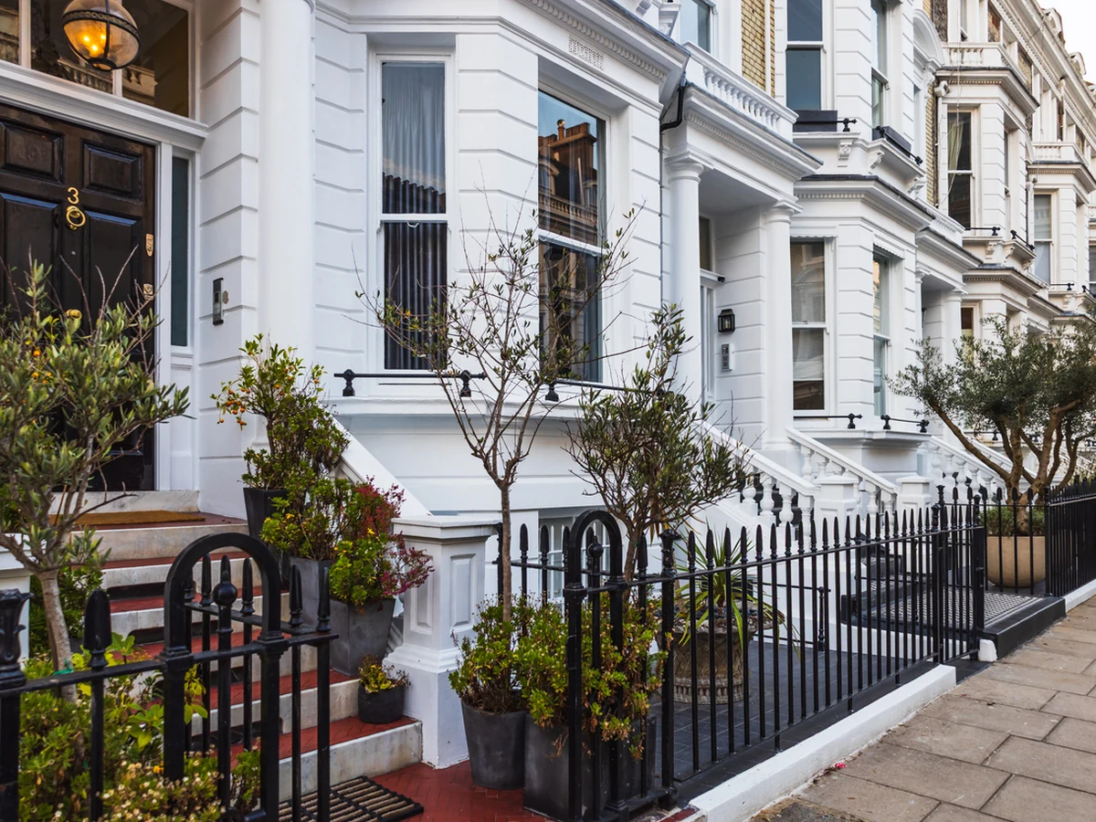 White Victorian townhouses White Victorian townhouses exterior painted by Cheshire Painters