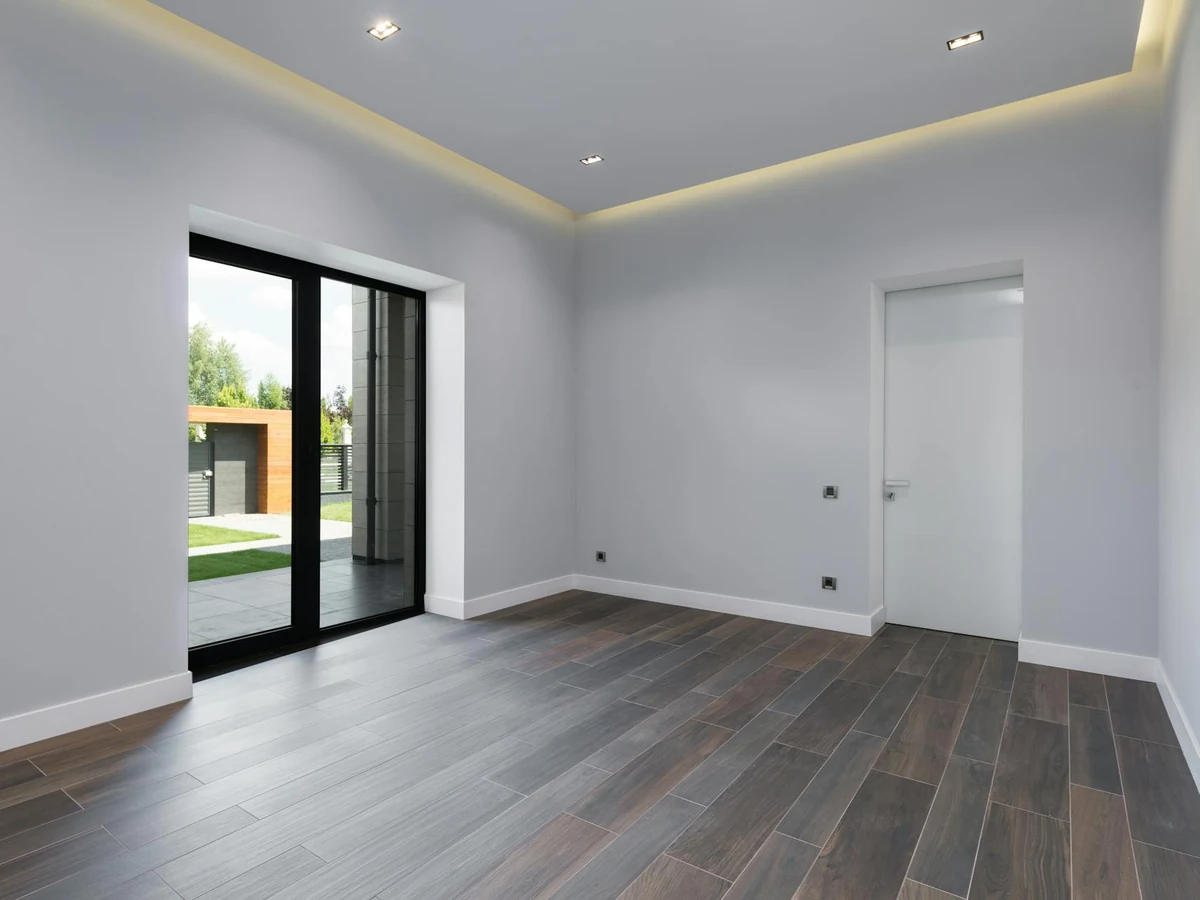 Interior painting empty grey room Interior painting of empty grey room in Wilmslow by Cheshire Painters