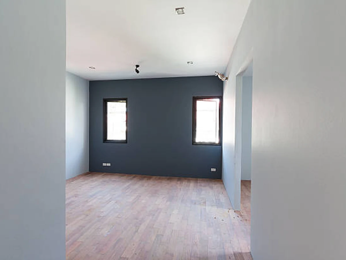 Interior painting of an empty dark room by Cheshire Painters