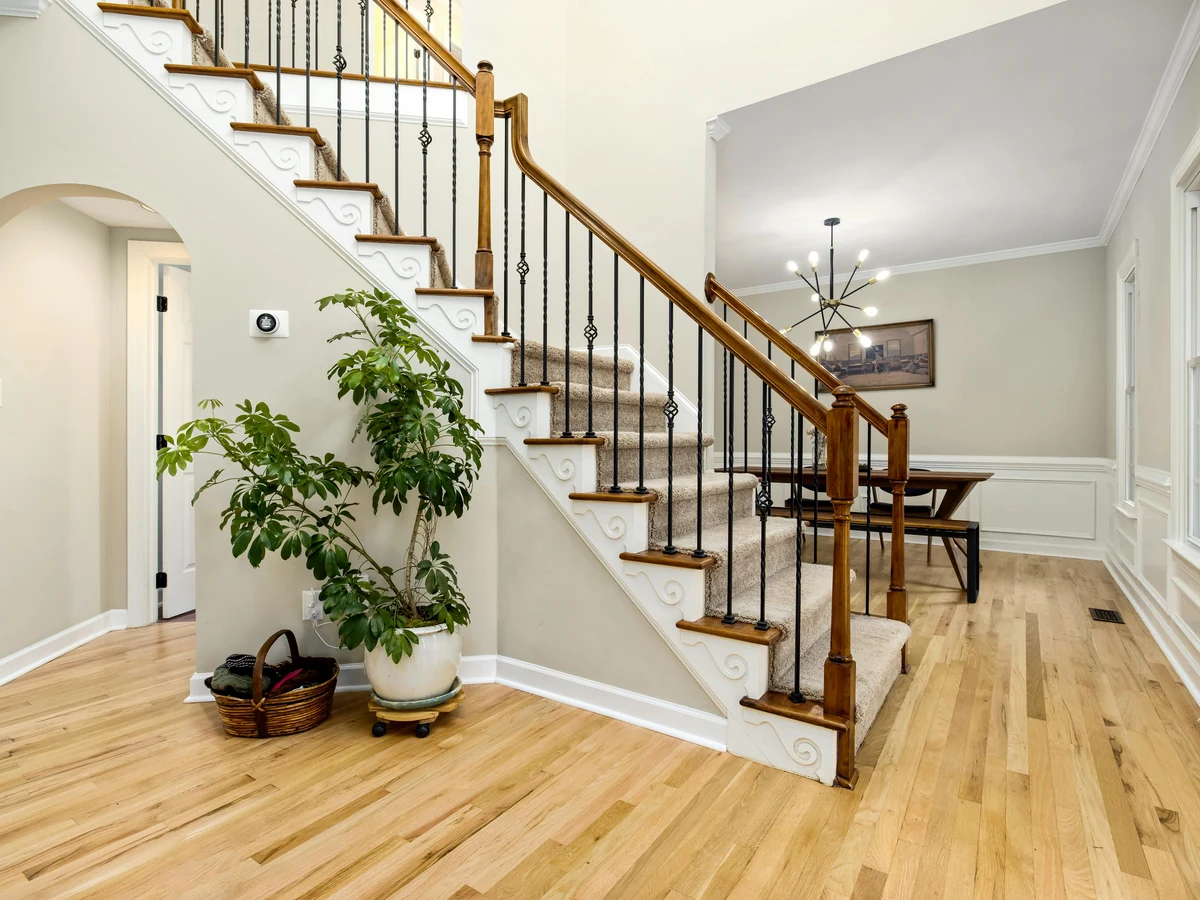 Traditional wooden staircase painted by Cheshire Painters in Wilmslow