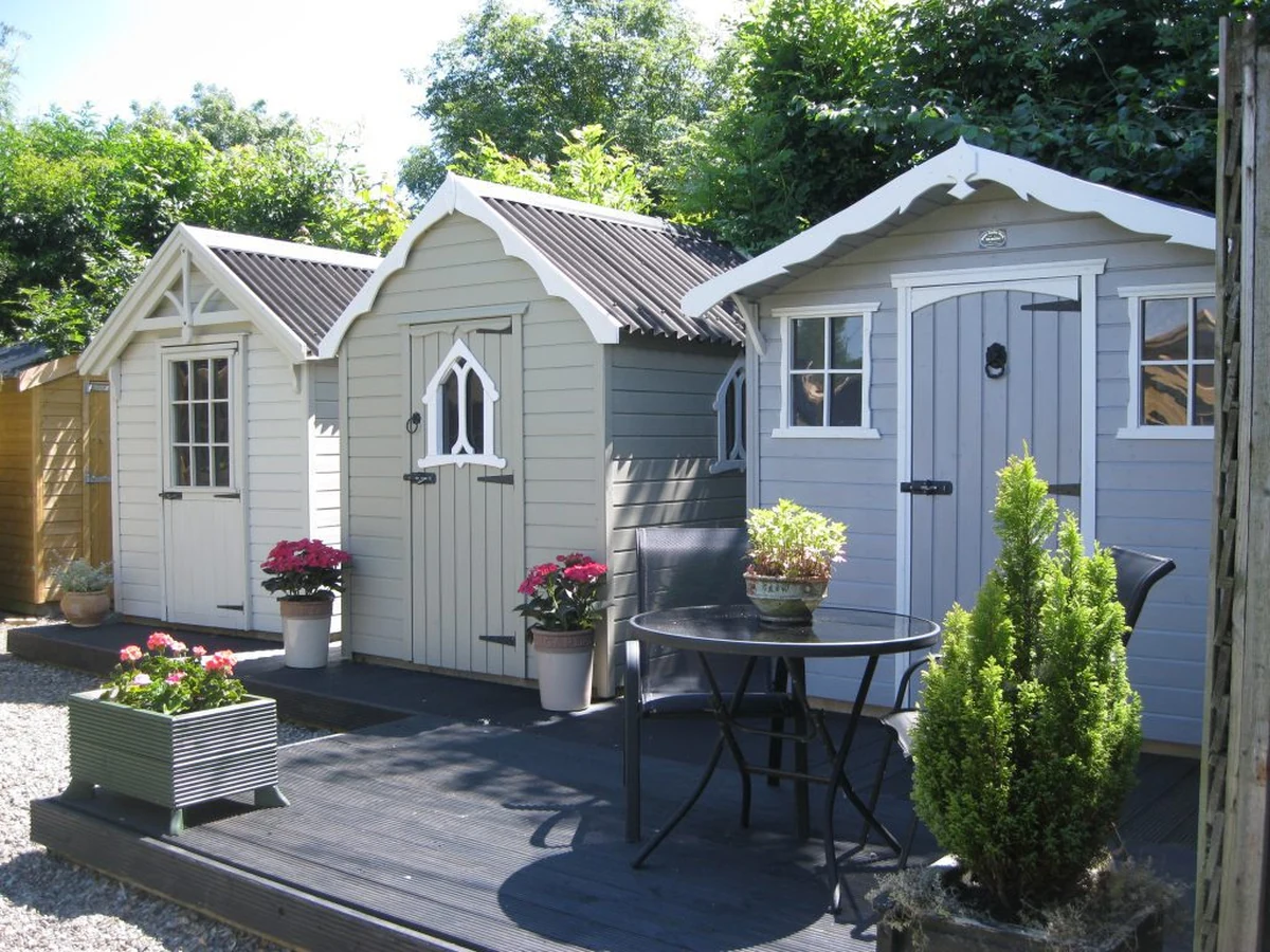 wood-painting-two-garden-sheds-cheshire-painters Exterior wood painting in Cheshire by Cheshire Painters, timber outbuildings
